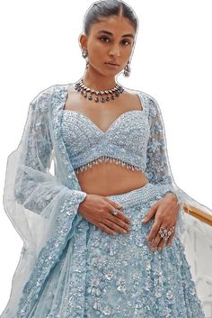 Blue Sequined Sets For Reception, Embellished Blue Sets For Reception, Elegant Blue Lehenga With Sequins, Elegant Blue Choli With Sequins, Blue Sequined Choli For Reception, Blue Sharara With Sequins For Reception, Blue Sequined Sharara For Reception, Glamorous Blue Sequined Lehenga, Blue Glamorous Lehenga For Reception