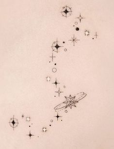 an artistic tattoo design with stars and a surfboard