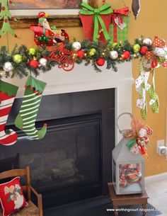 a fireplace decorated for christmas with stockings and stocking