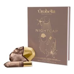 NIGHTCAP Duo Gift Set - HLDY 2024 GFT ST 2 (NGHTCP 50ML + 10ML)FeaturesHydratingAlcohol-FreeDermatologist Tested, Suitable for Sensitive SkinBi-phase Formula: Nourishing ORELIXIR Base + Aura-Elevating ScentsLong-lasting, All Day Wear (up to 8 hours)1% of Net Sales Donated to CharityKey NotesTop: Ginger, Cardamom, GuaiacwoodMiddle: Vanilla, CistusBase: Sandalwood, PatchouliPlus Aromatherapy Essential Oils: Patchouli Essential Oil, Cistus Essential Oil, Copaiba Essential OilIncludesNIGHTCAP Skin P Perfume For Date Night, Sweet Night Perfume Aesthetic, Nightcap Perfume Orebella, Sun Moon Stars Perfume, Date Night Fragrance, Patchouli Essential Oil, Fragrance Set, Night Cap, Essential Oils Aromatherapy