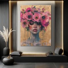 a painting with pink flowers on it in a living room