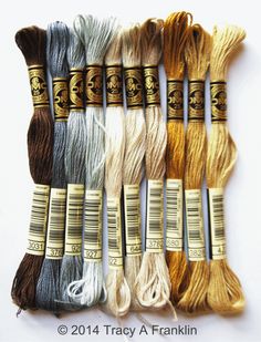 six skeins of different colors of yarn