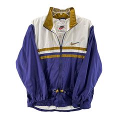 Vintage Nike Windbreaker Track Jacket for women in size large. The Hi-Lo Lined design is multicolored in purple, gold, and white. Made with a polyester blend.  * Size: Large * Brand: Nike * Style: Windbreaker * Material: Polyester Blend * Color: Multicolor Vintage Nike Windbreaker, Nike Windbreaker, Nike Vintage, Nike Womens, Nike Fashion, Track Jacket, Vintage Nike, Track Jackets, Purple Gold