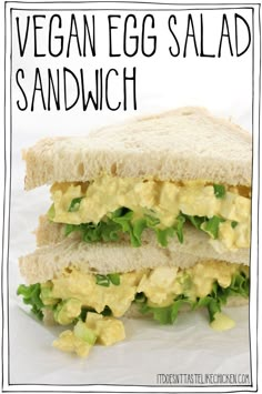 an egg salad sandwich with lettuce and cheese