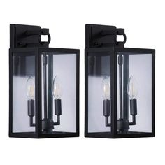 two black outdoor lights with one light on each side and the other on the wall