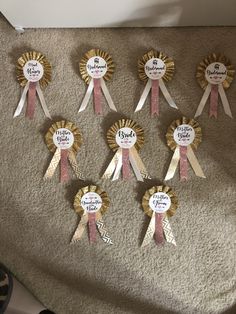 six ribbons are placed on the floor in order to be awarded for their individual achievement