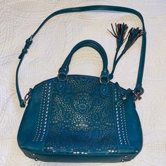 American West Dark Teal Purse. Has Hand Straps And Over Shoulder Strap. Three Pockets In The Inside. Two Pockets On The Back Side. Minimal Scuffs On The Bottom Corners. Dark Teal Handbag, American West Handbags, Teal Purse, Leather Tote Purse, Brown Leather Shoulder Bag, Leather Shoulder Handbags, American West, Leather Fringe, Dark Teal