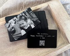 two personalized black and white photos in a wooden box with a card holder on top