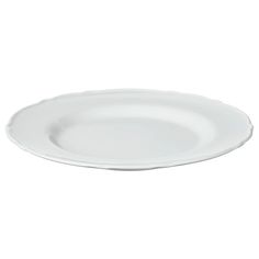 an empty white plate on a white background