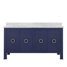 a blue cabinet with marble top and three brass pulls on the doors, in front of a white background