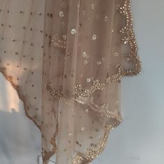 Golden Indian Dupatta party wear | Long net embroidered scarf | Punjabi dress dupattas with zari embroidery for lehenga | Dupatta This Dupatta is sequin embroidered on net with beautiful golden border scallop. This can we your wedding dress chunni for Indian occasion wear for festival. This has perfect bling for you to look classy and ethnic at same time. This can even be your home decoration fabric for you can even wear them with lehenga. This can be made in any color. We can even make a jacket Golden Duppata For Lehenga, Golden Dupatta For Lehenga, Simple Dupatta Designs, Golden Dupatta Designs, Duppattas Designs Ideas For Lehenga, Dupatta Designs Ideas Diy, Fancy Dupatta Design, Simple Dupatta, Latest Dupatta Designs