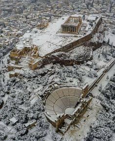 an aerial view of the ancient city in winter