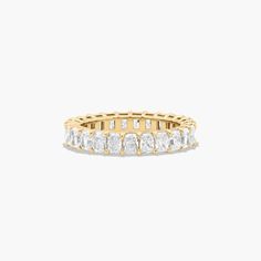 14K Yellow Gold Radiant Cut Diamond Eternity Ring (3 CTW H-I / SI1-SI2). This timeless eternity ring features the boldness and intense sparkle of radiant cut diamonds. A classic, tailored shared prongs setting allows the maximum amount of the diamonds surface to show. Number of diamonds and carat total weight will vary depending on ring size. Luxury Heirloom Diamond Cut Eternity Band, Luxury Heirloom Eternity Band With Diamond Cut, Luxury Yellow Gold Eternity Band For Wedding, Luxury Heirloom Eternity Band For Engagement, Luxury Yellow Gold Half Eternity Wedding And Engagement, Luxury Yellow Gold Eternity Band For Formal Occasions, Luxury Gold Eternity Band For Formal Occasions, Luxury Heirloom Style Eternity Band As Promise Ring, Luxury Classic Yellow Gold Eternity Band