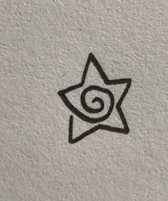 a black and white drawing of a star with a spiral in it's center