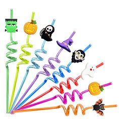 a group of halloween themed plastic straws on a white background