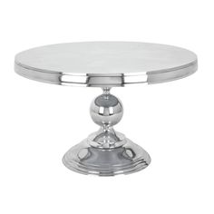 a silver cake stand on a white background