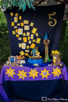 a table topped with lots of food and decorations