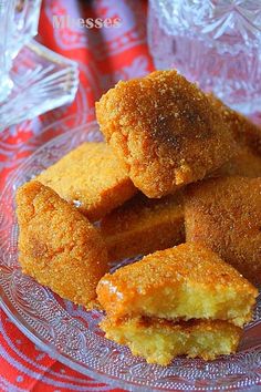 some fried food is on a glass plate