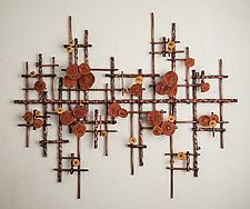 a wall sculpture made out of rusty metal rods and wooden crosses with buttons on them