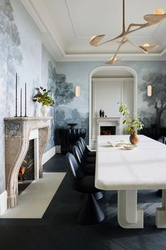 a living room filled with lots of white furniture