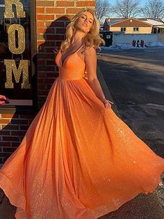 Silhouette:?A Line Waist: Natural Sleeve Length:?Sleeveless Shown Color: Orange Built-In Bra: Yes Grad Dresses Orange, Orange Sparkly Prom Dress, Orange Grad Dress, Neon Orange Prom Dress, Orange Dress Aesthetic, Bright Red Prom Dress, Prom Dresses Poofy, Prom Dresses Orange