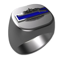 a silver ring with a blue stripe on it