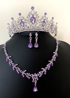 💜 Purple Baroque Bridal Tiara Set - Wedding Quinceanera Crown, Crystal Necklace and Earrings set for brides. Absolutely Stunning Crystal Bridal Necklace and matching earrings set with Purple Tiara!   💜 Luxury Wedding Headpiece encrusted with crystals. This jewelry set is perfect for your special day! Includes a Stunning Tiara, matching necklace, and earrings that are beautifully crafted into a silver setting. Combined with many clear crystal rhinestones!   💜 This beautiful necklace set will dazzle and add an extra elegant look to the bride on your wedding day! A delicate design that will make a statement on your special day such as wedding events/ceremonies.   💜 The design is distinctive and absolutely goes with everything. You will continue to enjoy them after your wedding!   💜 This Purple Prom Jewelry, Purple Crystal Jewelry Sets For Wedding, Rapunzel Theme, Purple Tiara, Fairytale Wedding Decorations, Purple Quince, Quinceanera Crown, Bridesmaid Jewelry Set, Wedding Accessories For Bride