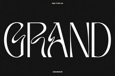 an old fashioned type of font that is black and white with the word grand written in it