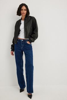 These jeans feature a mid rise fit with belt loops and a straight leg. They have a five-pocket design and a zip and button closure. Dark Blue Jeans Outfit, Dark Jeans Outfit, Straight Jeans Outfit, Straight Leg Jeans Outfits, Ribcage Jeans, Blue Jean Outfits, Mid Waist Jeans, High Waisted Cropped Jeans, Low Waist Jeans