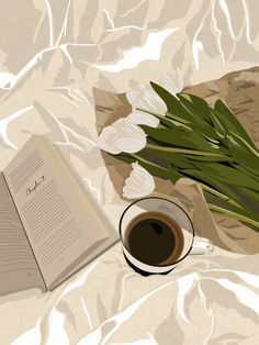 a cup of coffee next to an open book and some tulips on a table