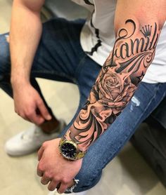 a man with a tattoo on his arm