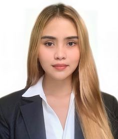 a woman with long blonde hair wearing a black blazer and white collared shirt