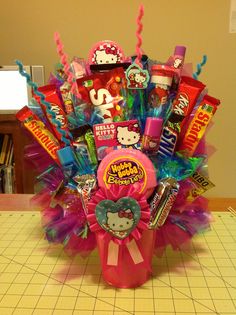 a hello kitty candy bouquet on a table