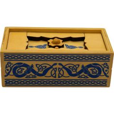 a wooden box with blue designs on it