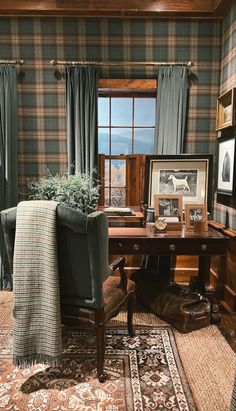 a chair and desk in a room with plaid walls