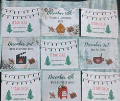 six christmas cards are displayed on a tablecloth with string lights and snowflakes