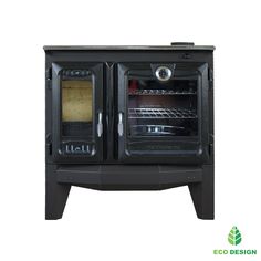 an old fashioned black stove with two ovens on it's sides and one door open