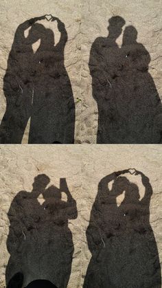 the shadow of two people standing next to each other with their hands on their heads