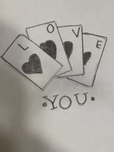 four playing cards with the words i love you written on them in cursive writing