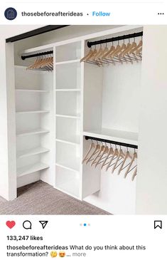 an open closet with white shelves and wooden hangers