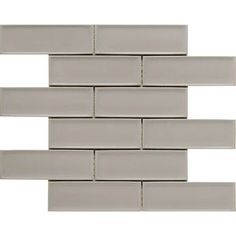 a white brick wall that is made out of tile