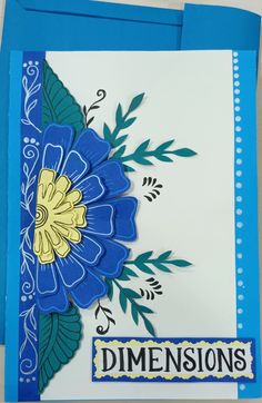 a close up of a card with blue flowers on it and the words dimensions