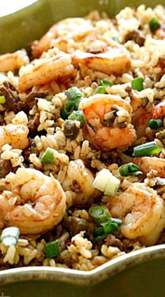 shrimp and rice dish in a green bowl