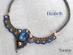 the necklace is made with blue beads and glass beads, which are beaded in gold