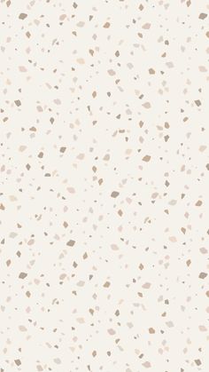 a white and brown speckled wallpaper pattern