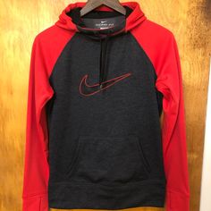 Women’s Nike Pullover Hoodie Size Small In Charcoal/Red/Black. Has Front Pocket And Thumb Holes. Fleece Lined No Tags But Never Worn. Nike Red Athleisure Hoodie, Nike Red Fleece Hoodie, Red Nike Sweatshirt With Drawstring Hood, Nike Red Sweatshirt With Drawstring Hood, Nike Red Sporty Hoodie, Sporty Red Nike Hoodie, Nike Red Crew Neck Hoodie, Nike Red Hoodie For Fall, Red Nike Hooded Top