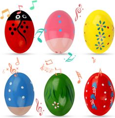 six different colored eggs with music notes around them