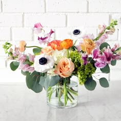 Spruce Flowers Cheyenne patel fresh floral  arrangement in a glass vase Small Flower Arrangements, Ceramic Store, Flower Business, Glass Cylinder, Soft Peach, Fresh Flowers Arrangements, Great Plains, Flower Arrangements Diy