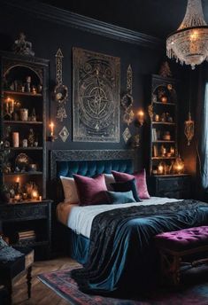 a bedroom with black walls and dark colored bedding, chandelier above the bed