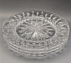 a clear glass bowl with an intricate design